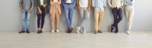 People lined up wearing business professional attire as an example of what to wear to court